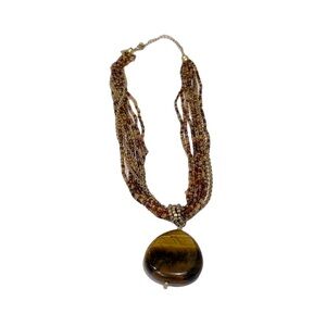 Lia Sophia Tiger’s Eye pendant on gold tone and beaded chain. EUC